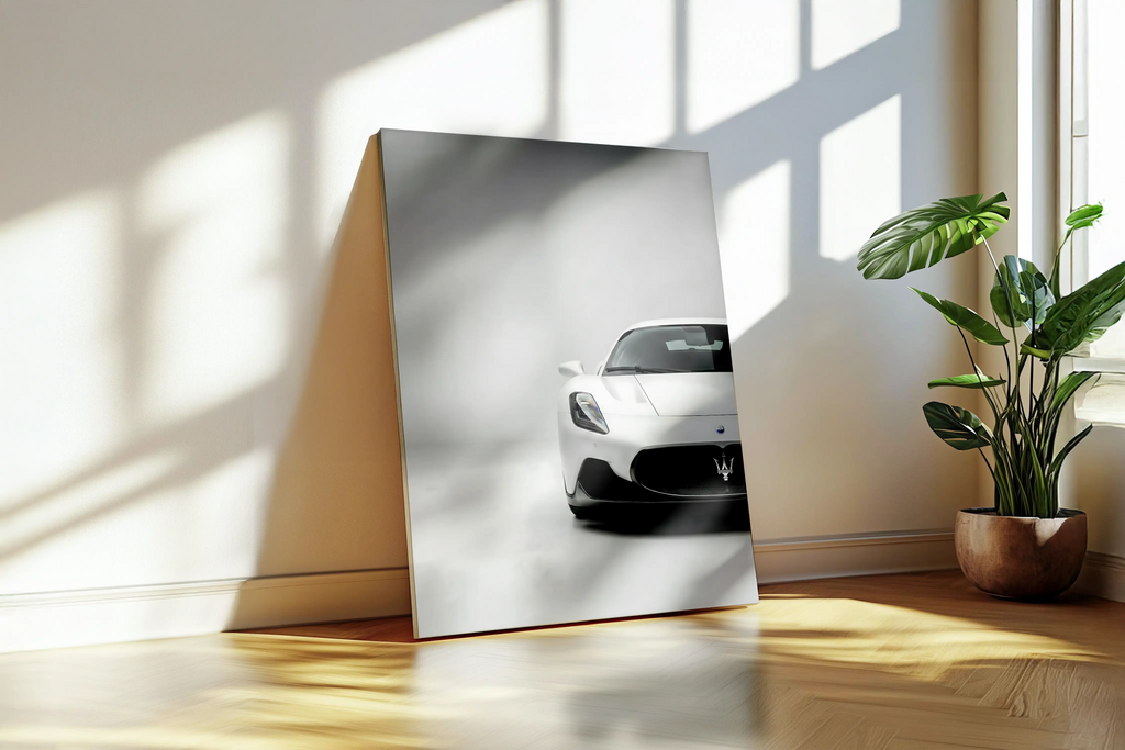 Metal print of a white supercar on a wooden floor with a plant in the background