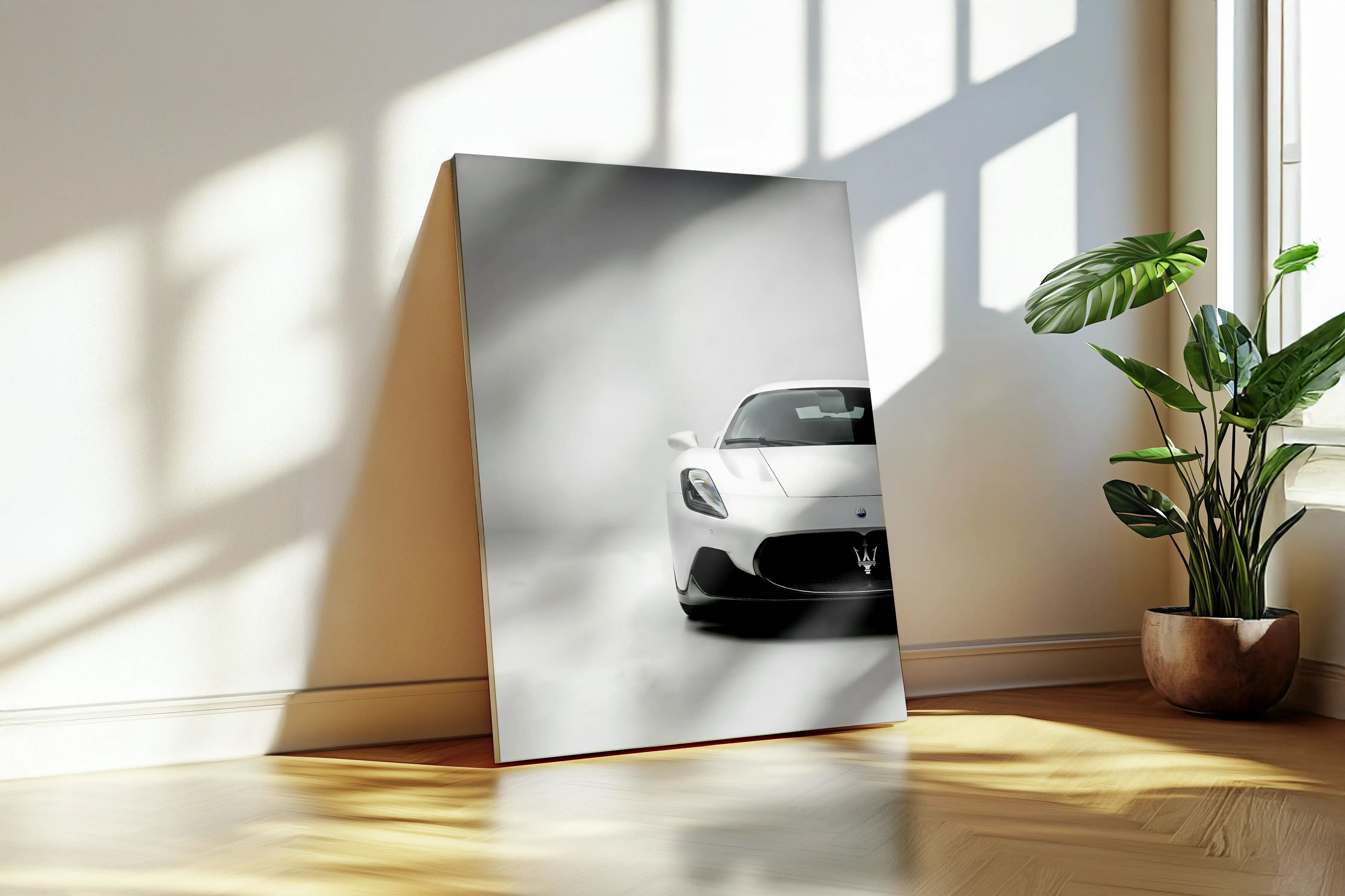 Metal print of a white supercar on a wooden floor with a plant in the background