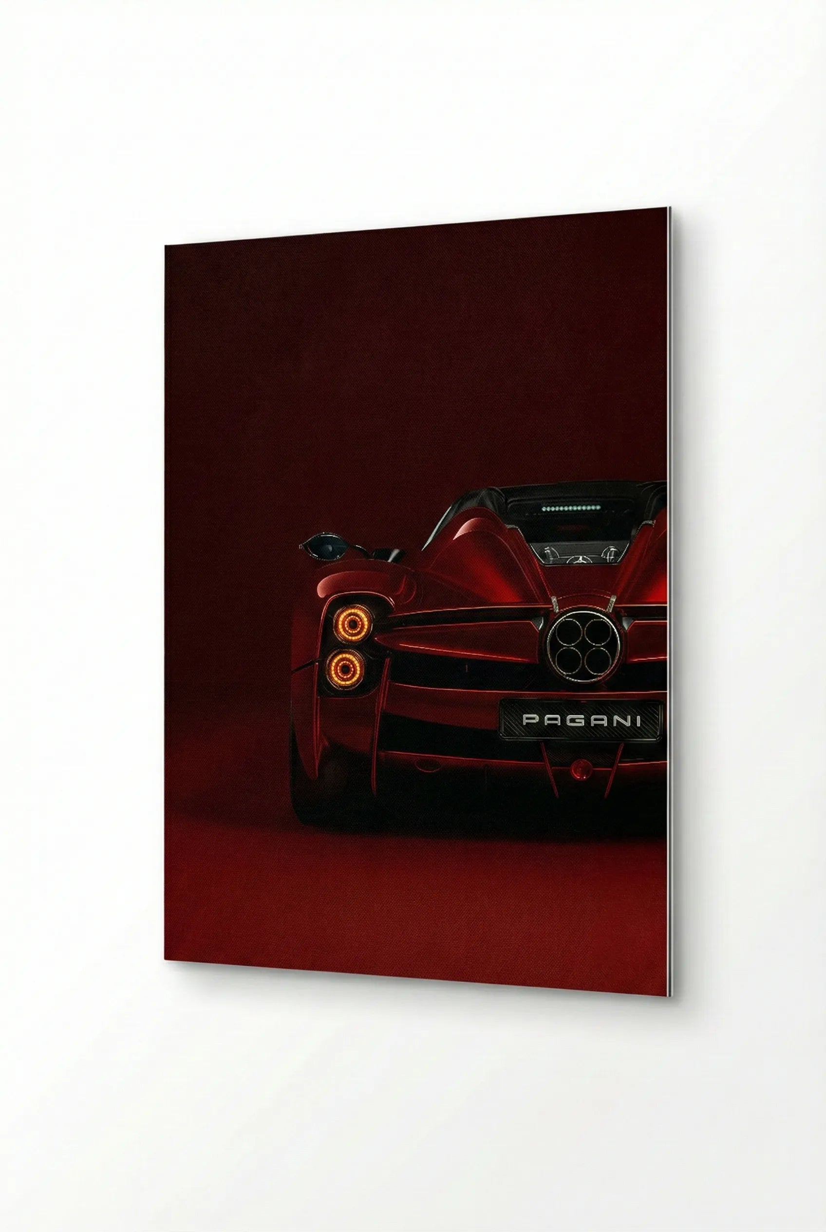 Red Pagani sports car on a dark red background
