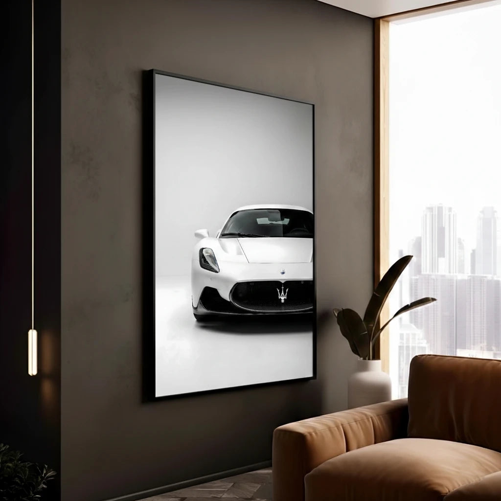 Framed artwork of a white Supercar car on a wall in a modern living room.